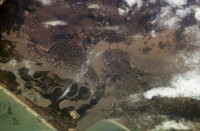image004 Lagos © NASA/JSC - Badagry Creek flowing in from the left of the image, and the edge of the lagoon on the right, joining to flow into the Atlantic at the bottom.